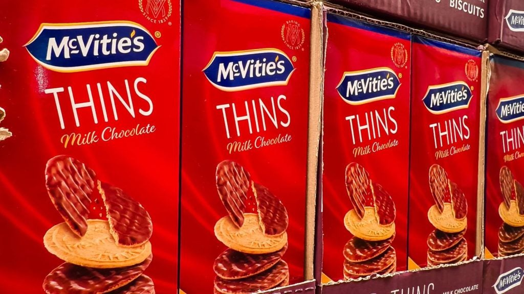 McVitie's Thins milk chocolate biscuits displayed on a supermarket shelf